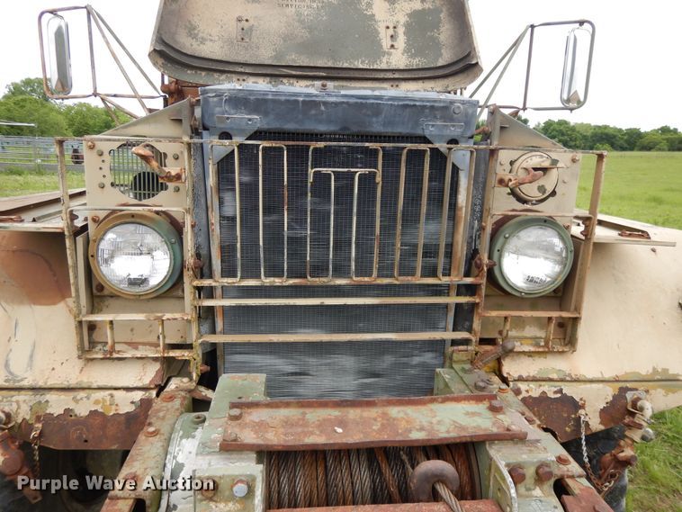 image for item DE5732 1967 Kaiser M44  flat dump bed truck