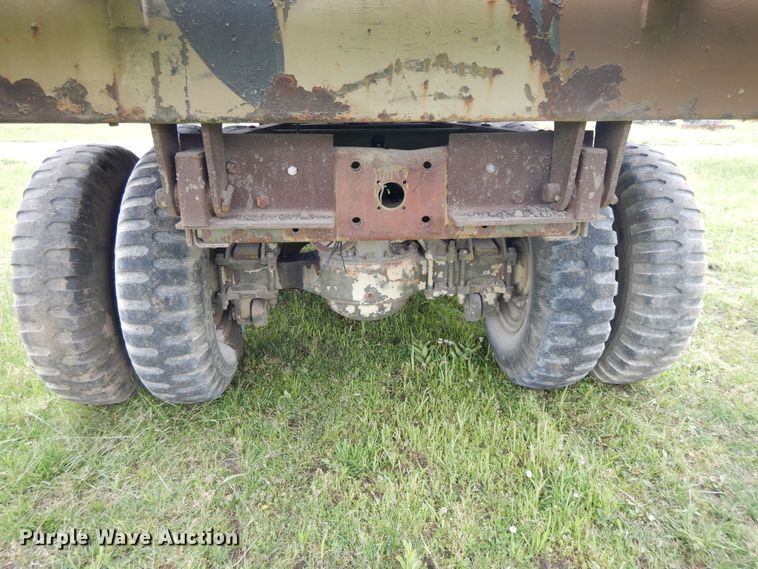 image for item DE5732 1967 Kaiser M44  flat dump bed truck