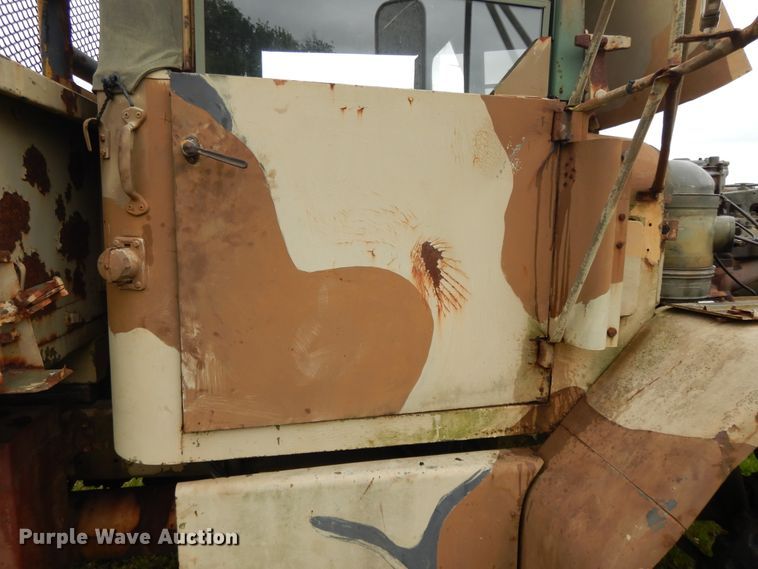 image for item DE5732 1967 Kaiser M44  flat dump bed truck