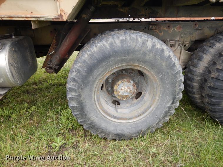 image for item DE5732 1967 Kaiser M44  flat dump bed truck