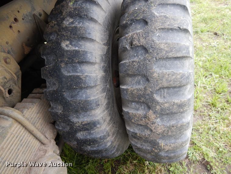 image for item DE5732 1967 Kaiser M44  flat dump bed truck