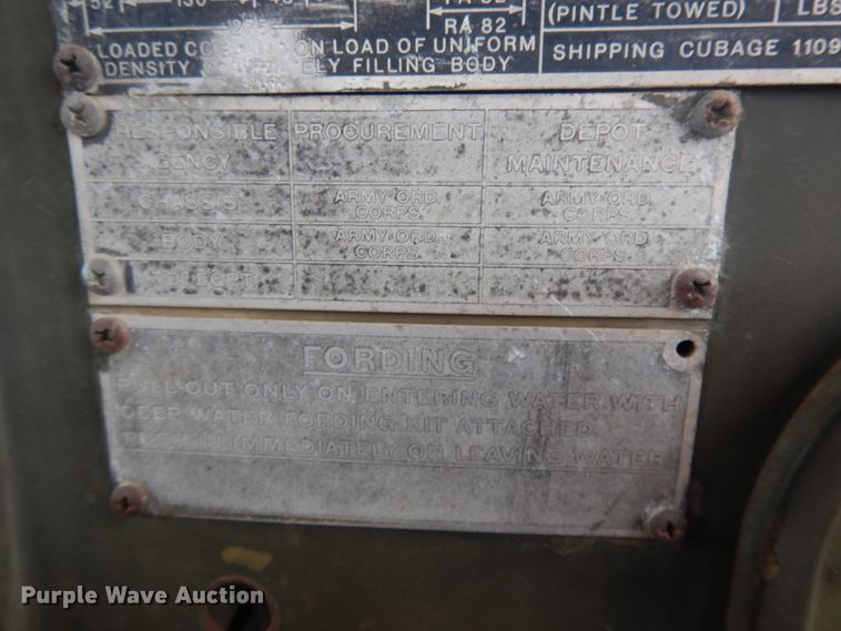 image for item DE5732 1967 Kaiser M44  flat dump bed truck