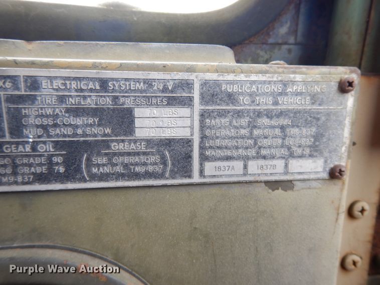 image for item DE5732 1967 Kaiser M44  flat dump bed truck