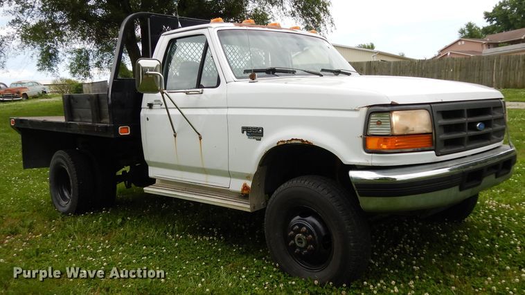 image for item DF4057 1995 Ford F350 XL  flatbed pickup truck