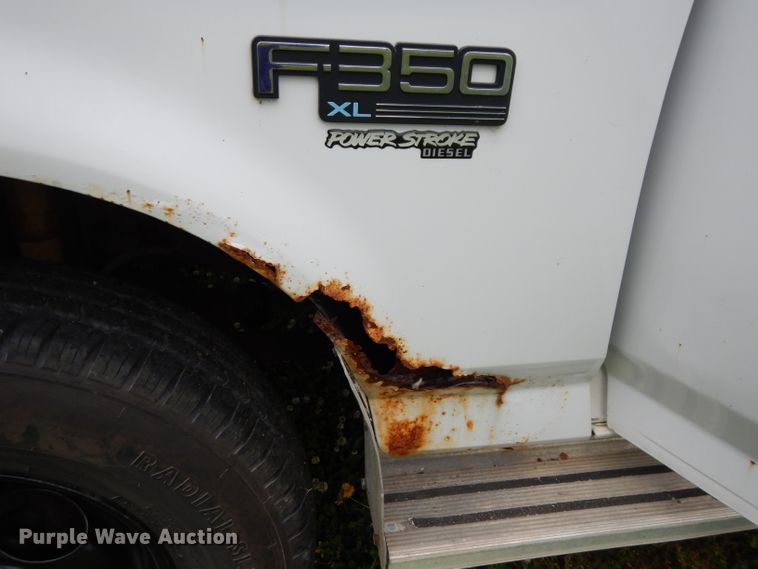 image for item DF4057 1995 Ford F350 XL  flatbed pickup truck