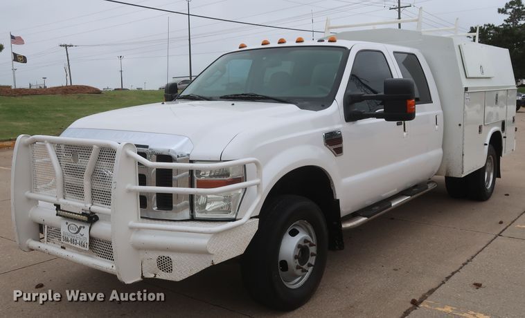 image for item DH0898 2010 Ford F350 Super Duty Lariat  Crew Cab utility bed pickup truck