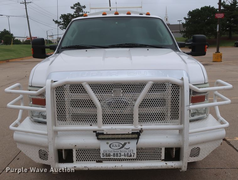 image for item DH0898 2010 Ford F350 Super Duty Lariat  Crew Cab utility bed pickup truck