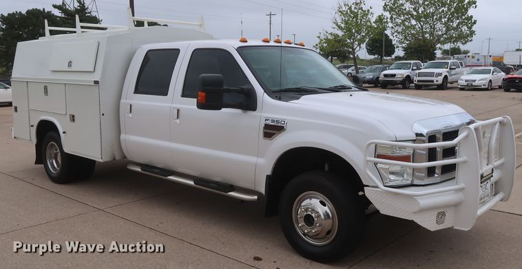 image for item DH0898 2010 Ford F350 Super Duty Lariat  Crew Cab utility bed pickup truck