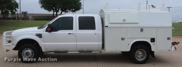 image for item DH0898 2010 Ford F350 Super Duty Lariat  Crew Cab utility bed pickup truck