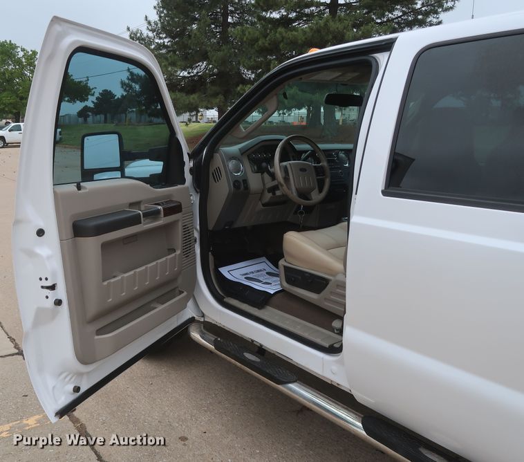 image for item DH0898 2010 Ford F350 Super Duty Lariat  Crew Cab utility bed pickup truck