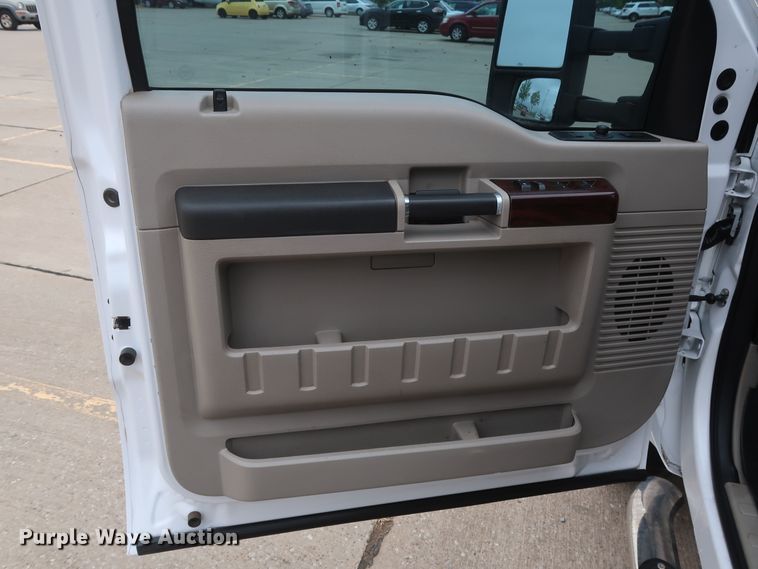 image for item DH0898 2010 Ford F350 Super Duty Lariat  Crew Cab utility bed pickup truck