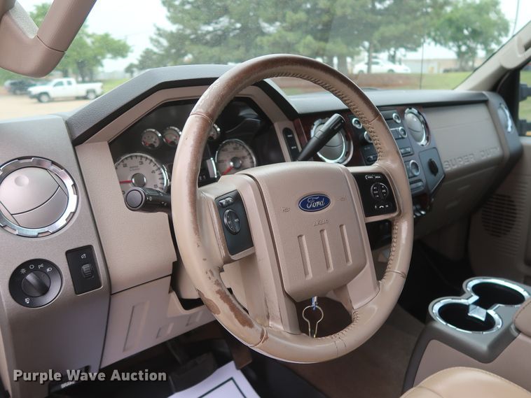 image for item DH0898 2010 Ford F350 Super Duty Lariat  Crew Cab utility bed pickup truck