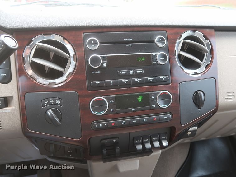 image for item DH0898 2010 Ford F350 Super Duty Lariat  Crew Cab utility bed pickup truck