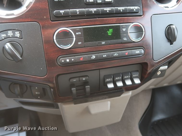 image for item DH0898 2010 Ford F350 Super Duty Lariat  Crew Cab utility bed pickup truck