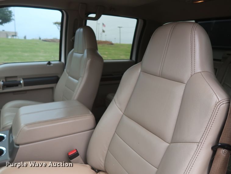 image for item DH0898 2010 Ford F350 Super Duty Lariat  Crew Cab utility bed pickup truck