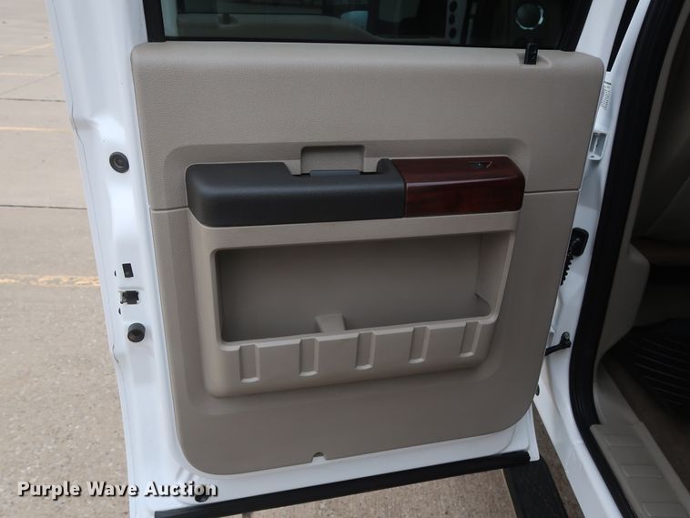 image for item DH0898 2010 Ford F350 Super Duty Lariat  Crew Cab utility bed pickup truck