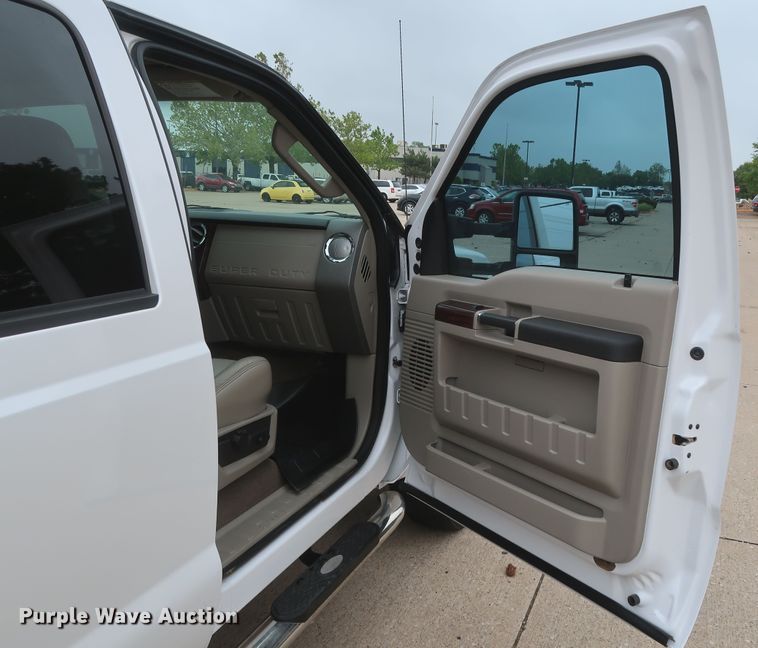 image for item DH0898 2010 Ford F350 Super Duty Lariat  Crew Cab utility bed pickup truck