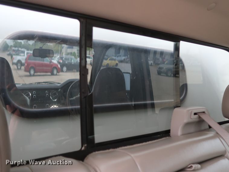 image for item DH0898 2010 Ford F350 Super Duty Lariat  Crew Cab utility bed pickup truck