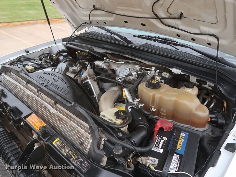 image for item DH0898 2010 Ford F350 Super Duty Lariat  Crew Cab utility bed pickup truck