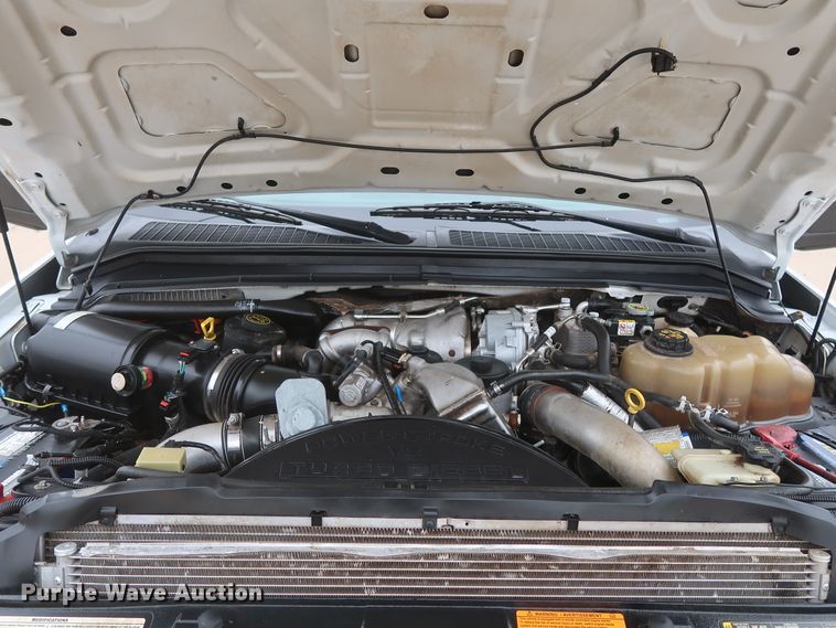 image for item DH0898 2010 Ford F350 Super Duty Lariat  Crew Cab utility bed pickup truck