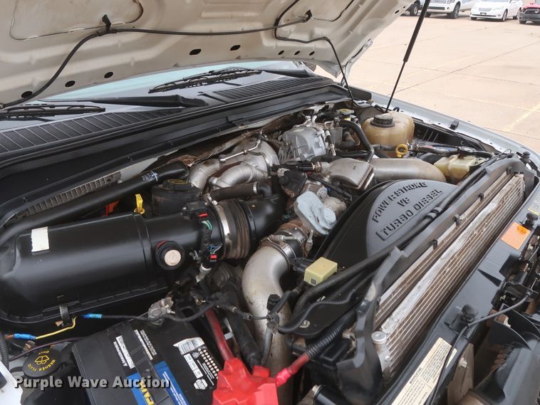 image for item DH0898 2010 Ford F350 Super Duty Lariat  Crew Cab utility bed pickup truck