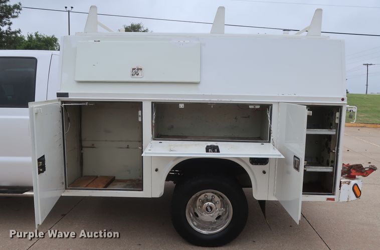 image for item DH0898 2010 Ford F350 Super Duty Lariat  Crew Cab utility bed pickup truck