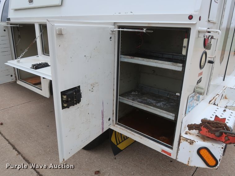 image for item DH0898 2010 Ford F350 Super Duty Lariat  Crew Cab utility bed pickup truck