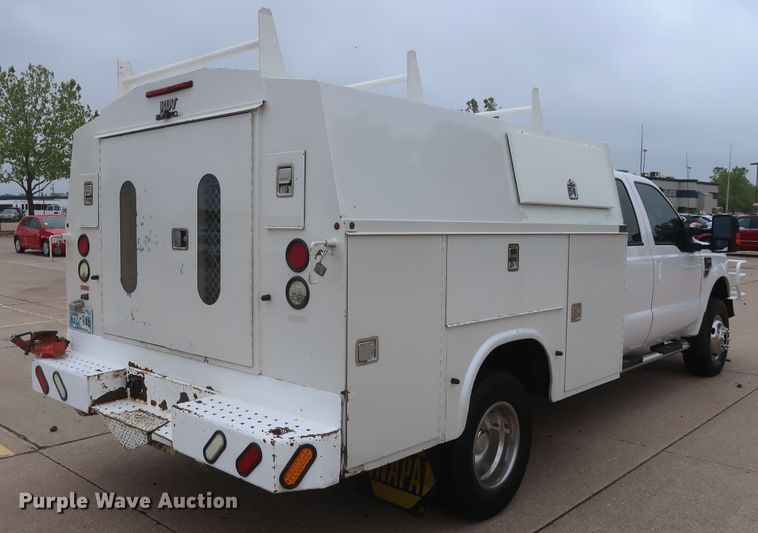 image for item DH0898 2010 Ford F350 Super Duty Lariat  Crew Cab utility bed pickup truck