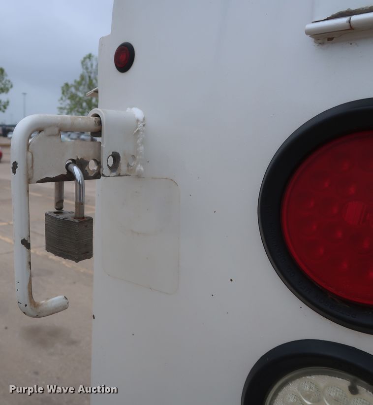 image for item DH0898 2010 Ford F350 Super Duty Lariat  Crew Cab utility bed pickup truck