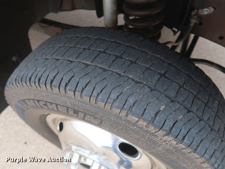 image for item DH0898 2010 Ford F350 Super Duty Lariat  Crew Cab utility bed pickup truck