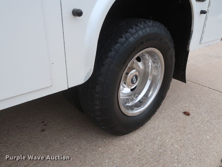 image for item DH0898 2010 Ford F350 Super Duty Lariat  Crew Cab utility bed pickup truck