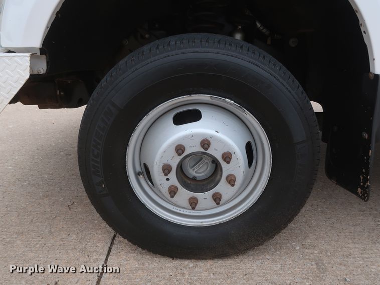 image for item DH0898 2010 Ford F350 Super Duty Lariat  Crew Cab utility bed pickup truck