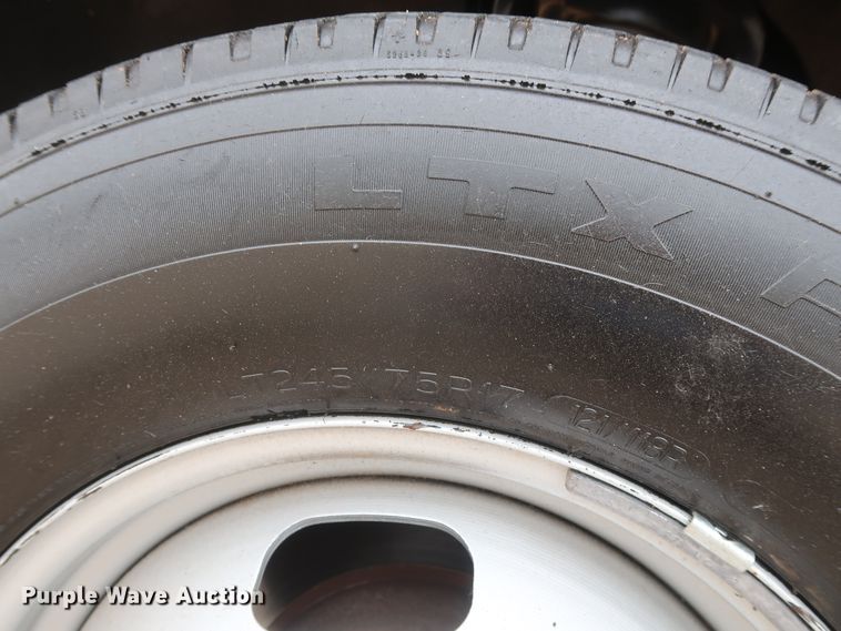 image for item DH0898 2010 Ford F350 Super Duty Lariat  Crew Cab utility bed pickup truck