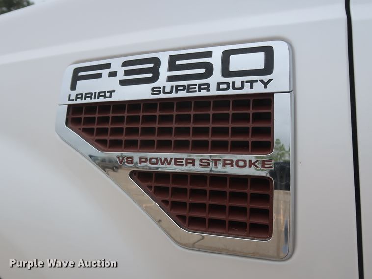 image for item DH0898 2010 Ford F350 Super Duty Lariat  Crew Cab utility bed pickup truck