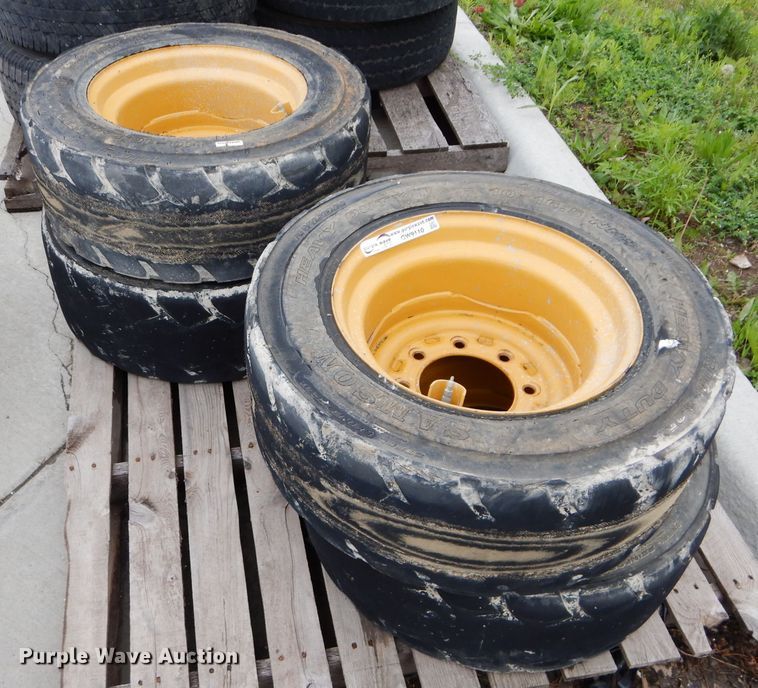 image for item GW9110 (4) Caterpillar 10-16.5 wheels and tires