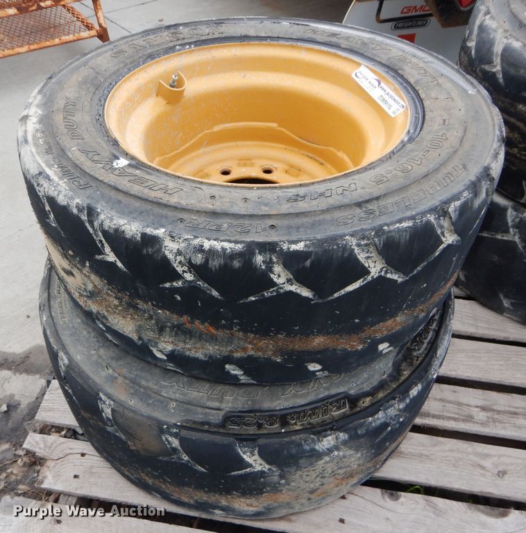 image for item GW9110 (4) Caterpillar 10-16.5 wheels and tires