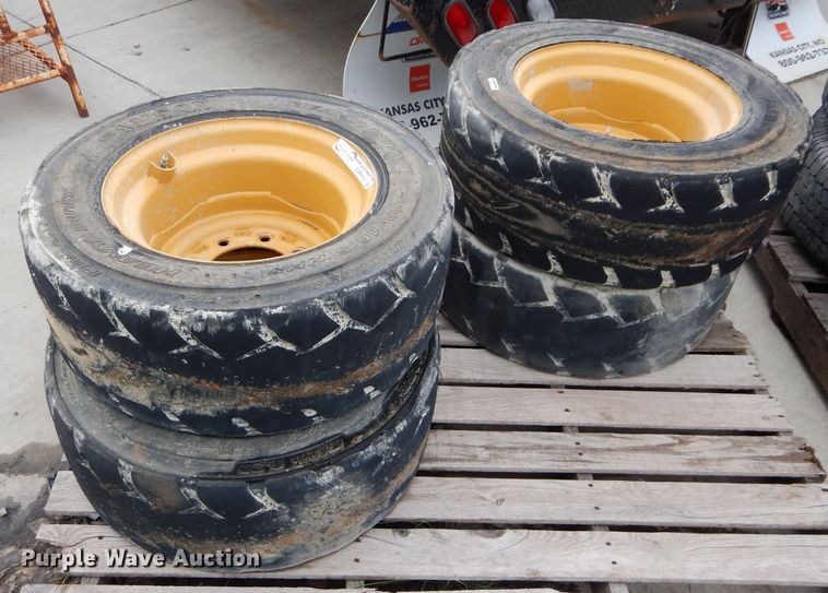 image for item GW9110 (4) Caterpillar 10-16.5 wheels and tires