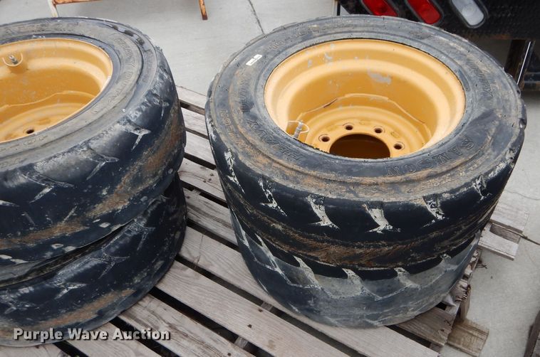 image for item GW9110 (4) Caterpillar 10-16.5 wheels and tires