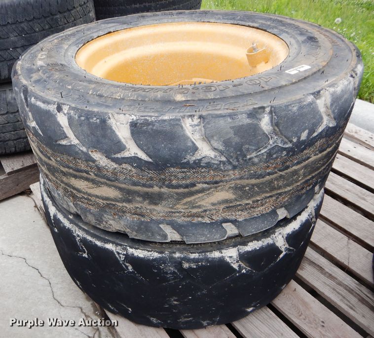 image for item GW9110 (4) Caterpillar 10-16.5 wheels and tires