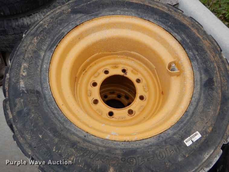 image for item GW9110 (4) Caterpillar 10-16.5 wheels and tires