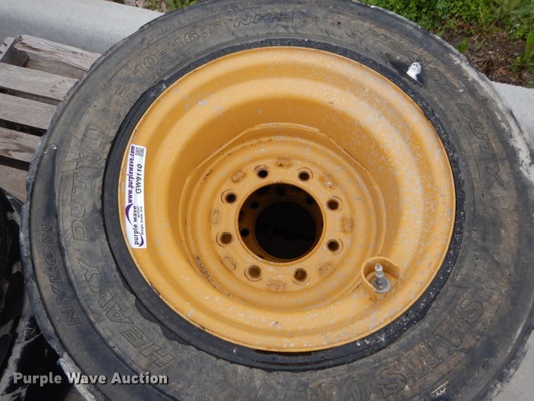 image for item GW9110 (4) Caterpillar 10-16.5 wheels and tires