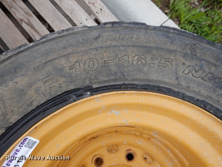image for item GW9110 (4) Caterpillar 10-16.5 wheels and tires