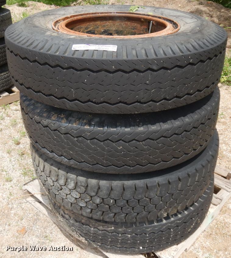 image for item GW9143 (4) 10.00-20 tires and wheels