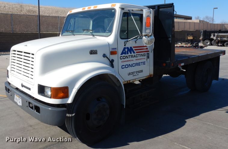 image for item GY9053 1999 International 4700 dump flatbed truck