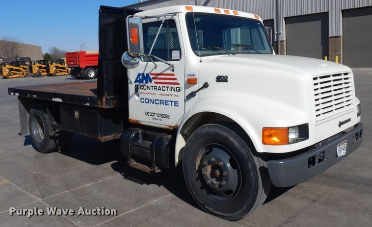 image for item GY9053 1999 International 4700 dump flatbed truck