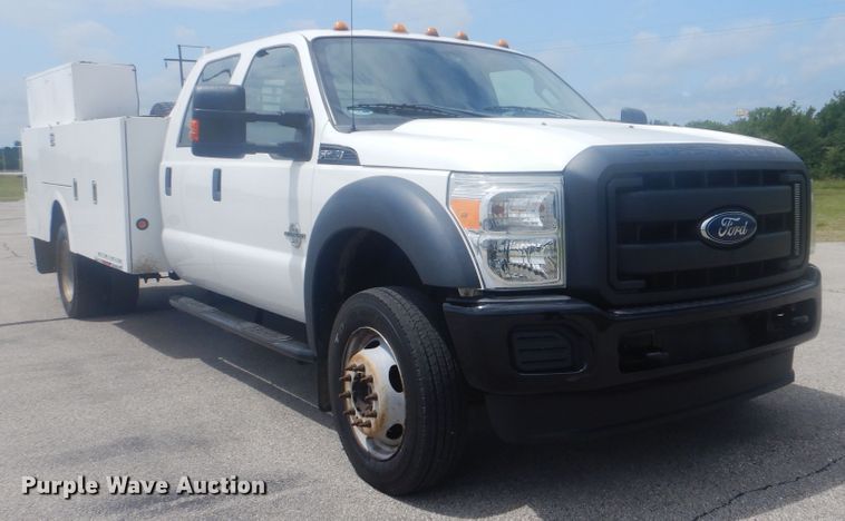 image for item GY9878 2013 Ford F550 Super Duty  Crew Cab utility bed truck