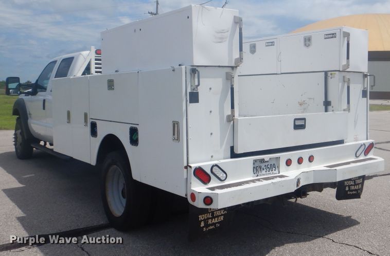 image for item GY9878 2013 Ford F550 Super Duty  Crew Cab utility bed truck