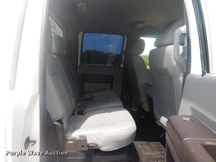 image for item GY9878 2013 Ford F550 Super Duty  Crew Cab utility bed truck