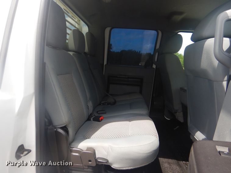 image for item GY9878 2013 Ford F550 Super Duty  Crew Cab utility bed truck