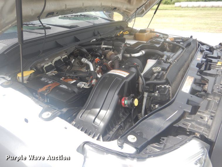 image for item GY9878 2013 Ford F550 Super Duty  Crew Cab utility bed truck